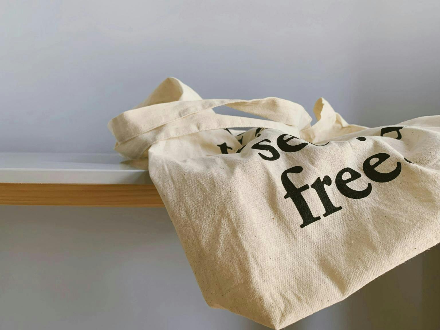 Cotton tote bag with the word 'free' showing on it